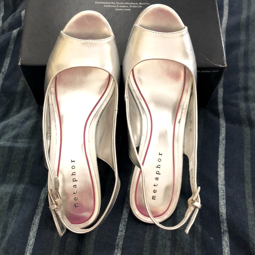 Metaphor silver color dress shoes.  Heel is 3.5”.